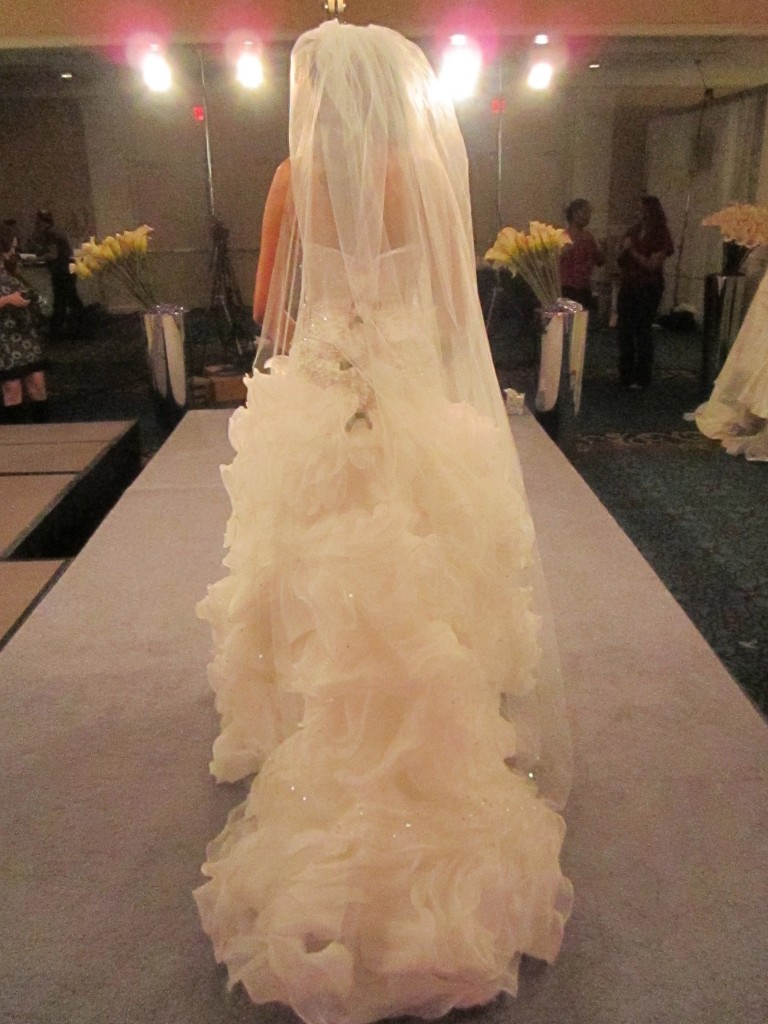 Because Melea’s gown was already so dramatic, I chose a simple cathedral-length veil by Malis Henderson.