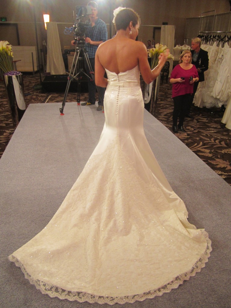 The back of Angela’s gown featured a train with a sequin-beaded lace overlay.